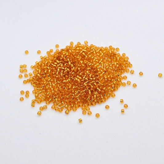 Toho Glass Seed Beads, 11/0 2.2mm, #22 Light Topaz Gold, Silver Lined, 7gm approx 730 beads, 0.7mm hole