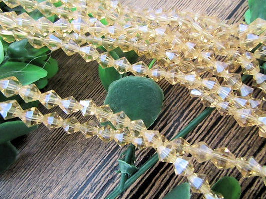 Bicone Beads, 5mm Crystal, Champagne Faceted Strand approx 60X 1mm hole Jewellery