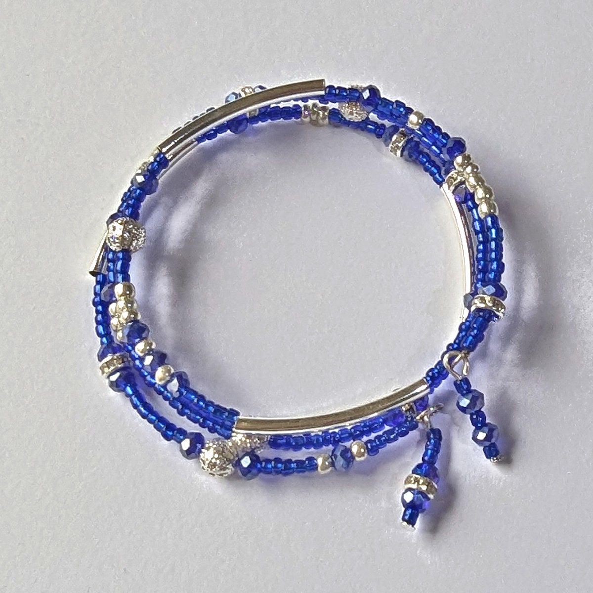 Blue Bead Bracelet with Silver accents, triple coil layers, memory wire
