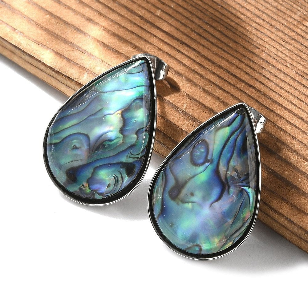 Ninky Designs Australia teardrop stud earrings featuring iridescent blue and green shell inlay in stainless steel.