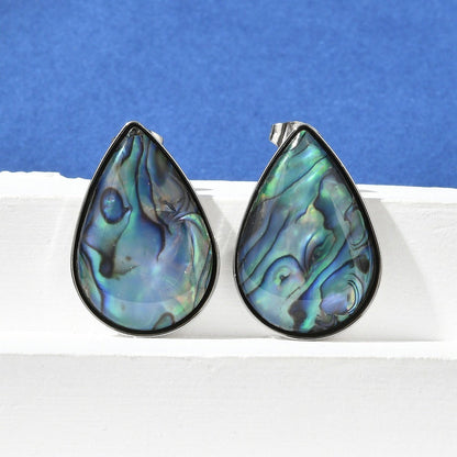 Ninky Designs Australia teardrop stud earrings featuring iridescent blue and green natural shell inlay in stainless steel